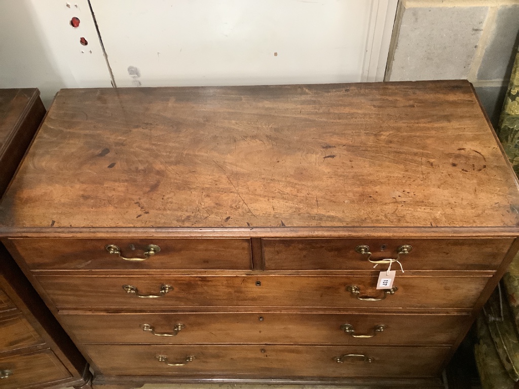 A George III mahogany chest fitted two short drawers and three graduated long drawers, width 114cm depth 52cm height 92cm